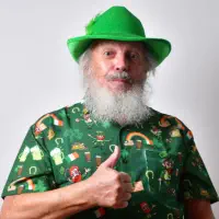 A senior man doing thumbs up pose